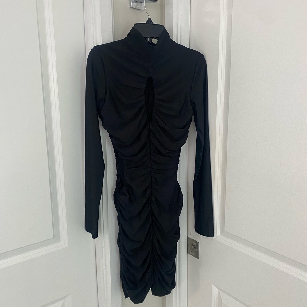 Tiger Mist dress in M. Black ruched long sleeve with 3 cutouts. NWT